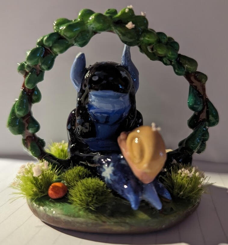 small 4 inch figurine painted with acrylic and coated in UV resin